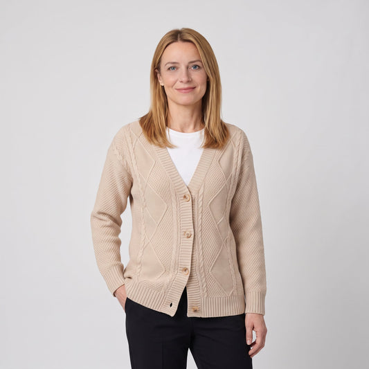 Woman wearing the cable knit button cardigan with v neck in soft knit