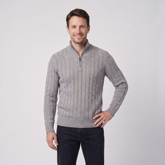 Man wearing a grey cable knit quarter zip jumper with funnel neck