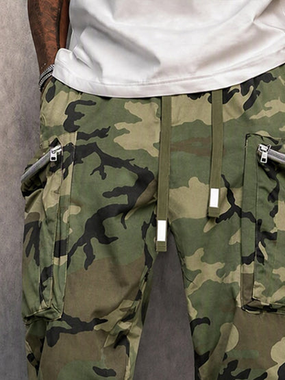 Camouflage cargo trousers with zippered pockets and drawstring