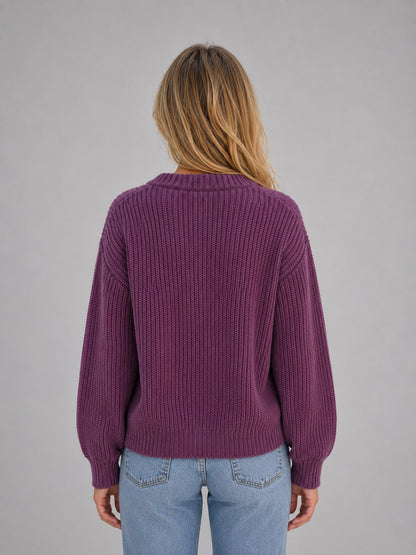 Back view of the plum cardigan showing the chunky ribbed knit
