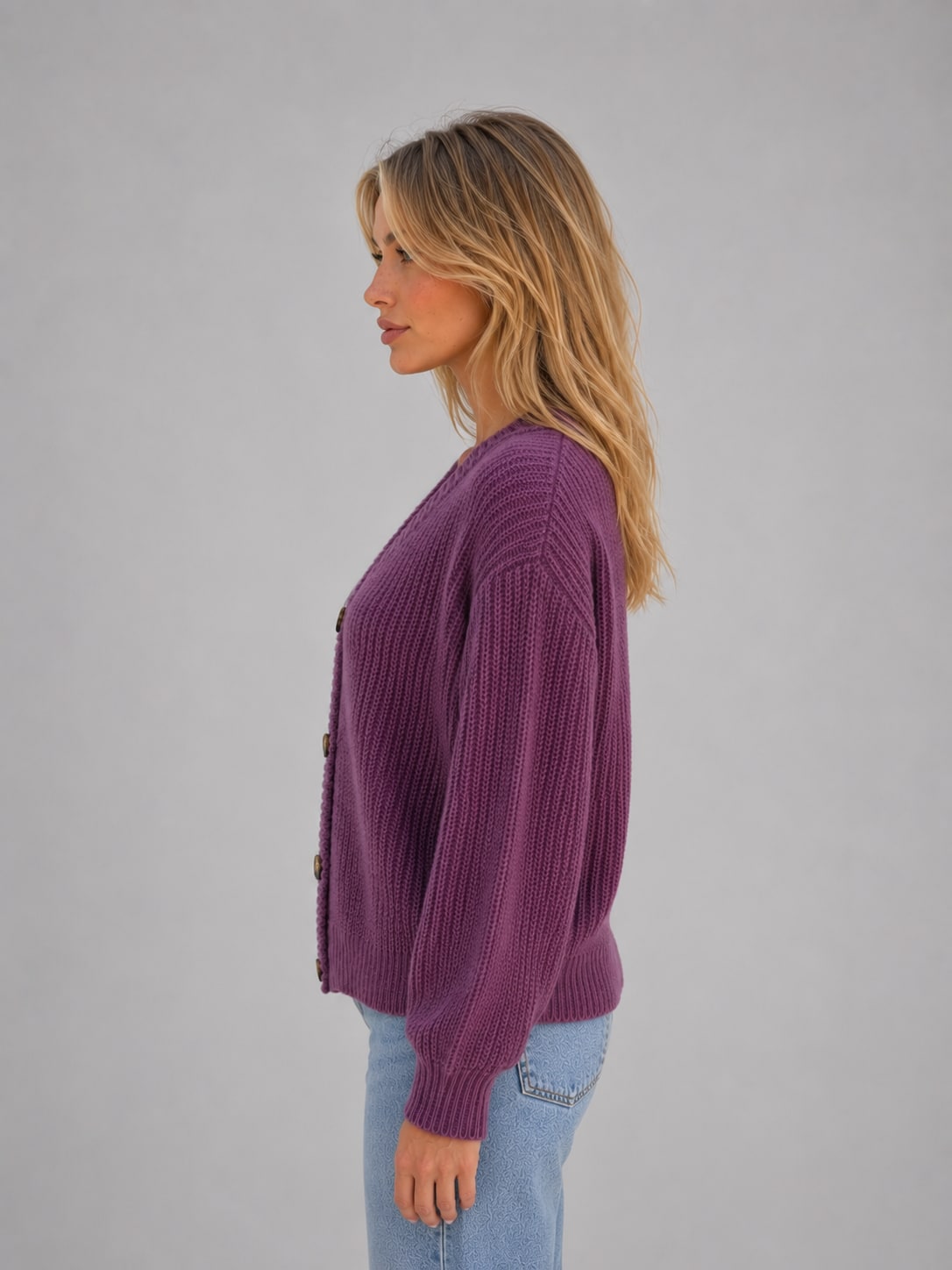 Side view of the plum chunky knit cardigan with ribbed cuffs
