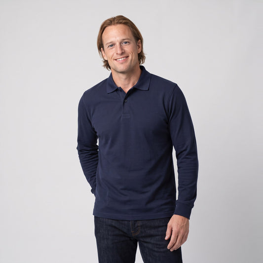 Man wearing a navy long sleeved polo shirt with ribbed cuffs