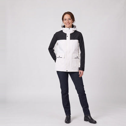 Woman wearing the colour block technical rain jacket with hood