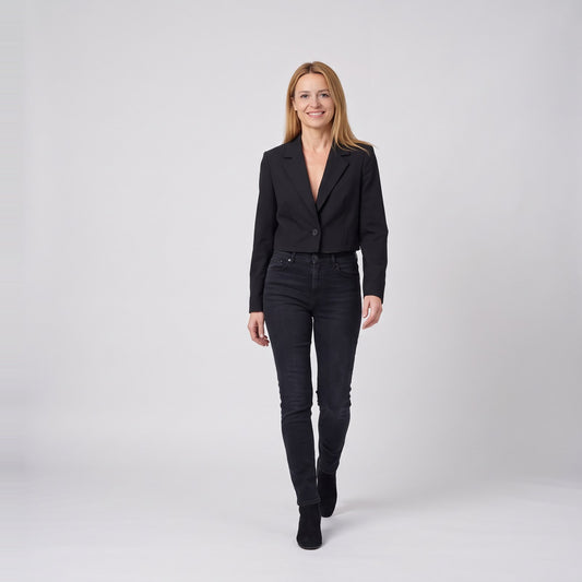 Woman wearing the cropped single button blazer with notch lapels
