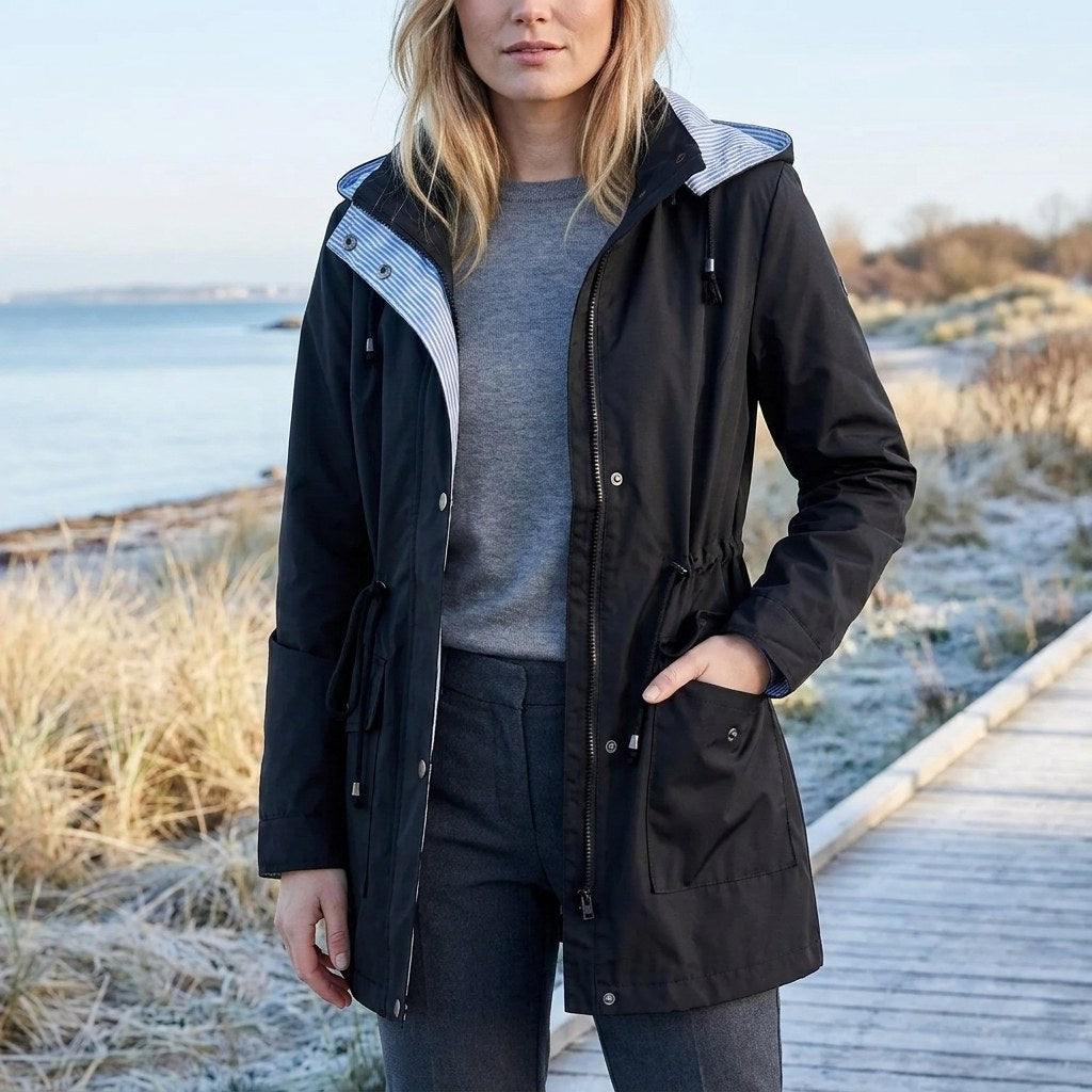 Black drawstring waist hooded parka worn open
