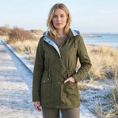 Olive green drawstring waist hooded parka worn outdoors, front view