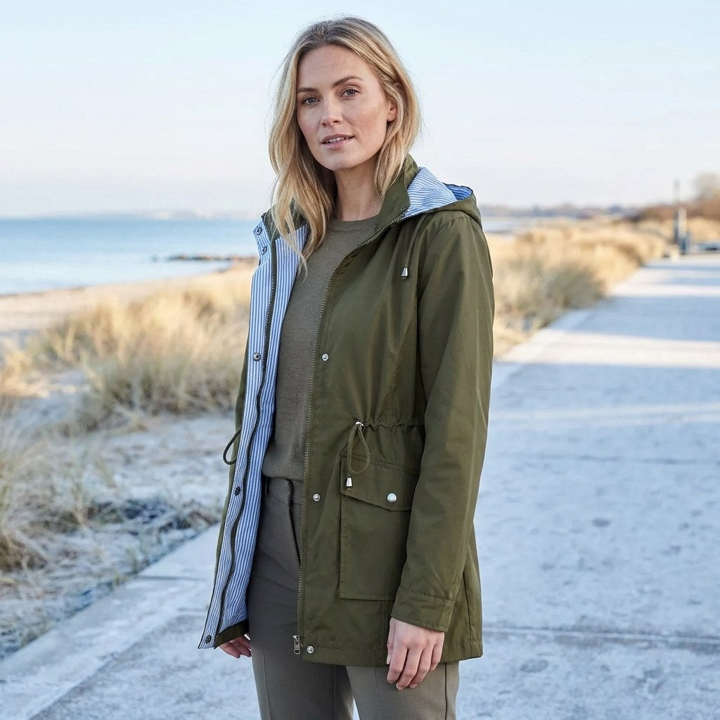 Olive green drawstring waist hooded parka worn open, striped lining visible