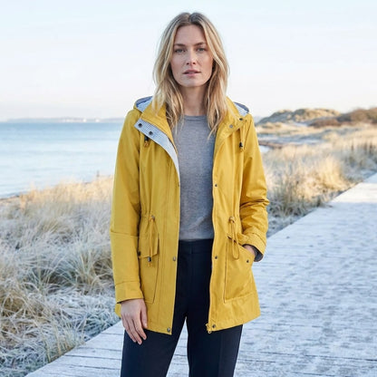 Yellow drawstring waist hooded parka worn open
