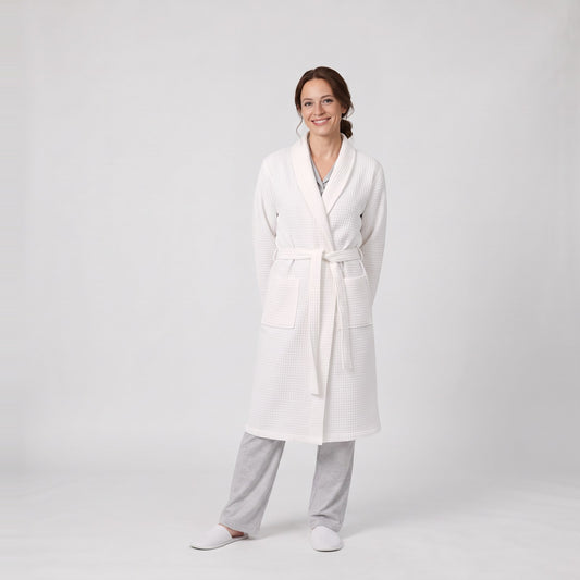 Woman wearing the waffle dressing gown with shawl collar and belt