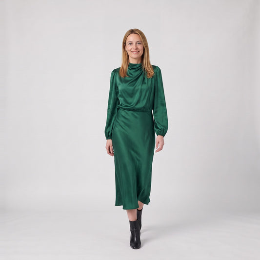 Woman wearing the elegant long sleeve satin midi dress with cowl neck