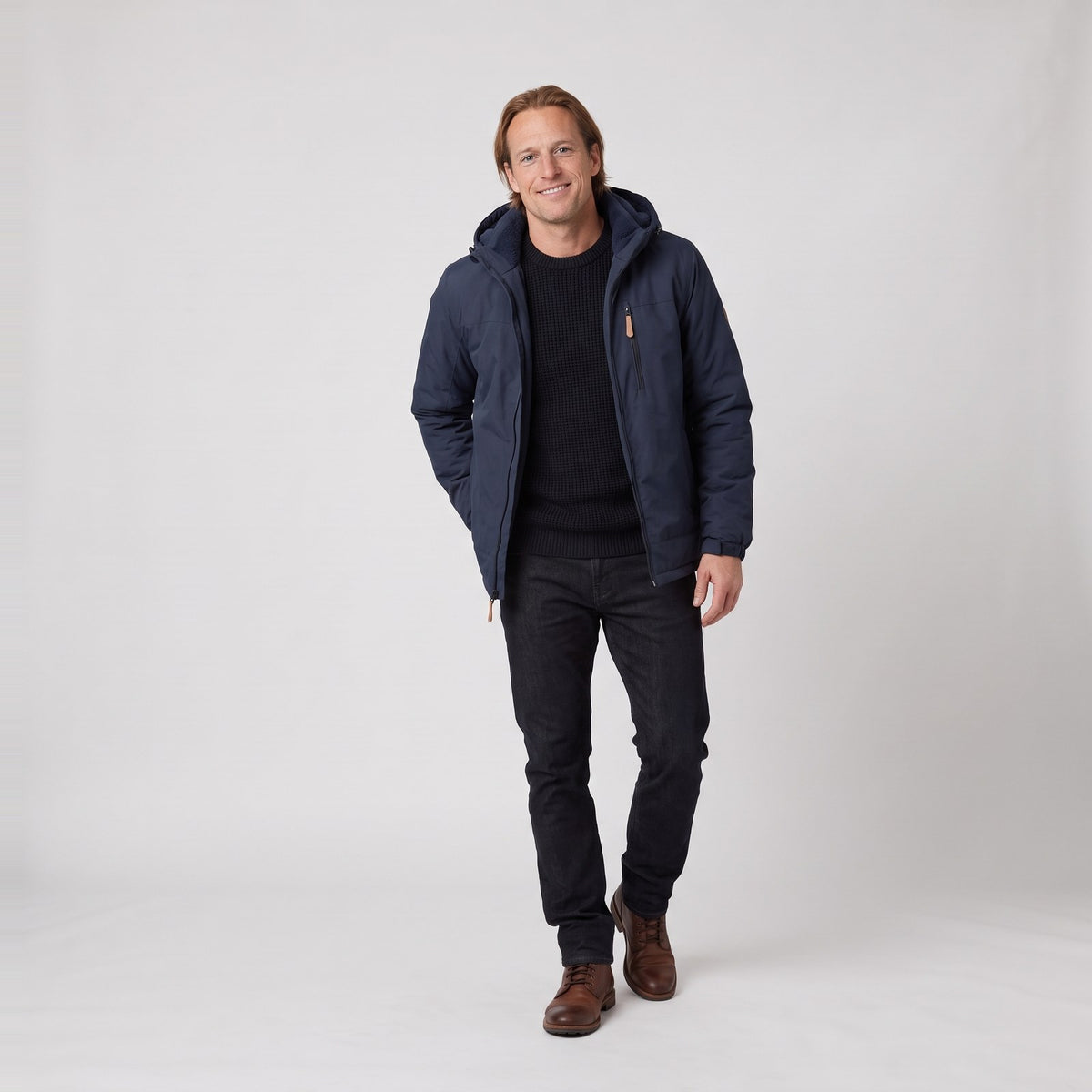 Man wearing the fleece lined winter jacket with detachable hood