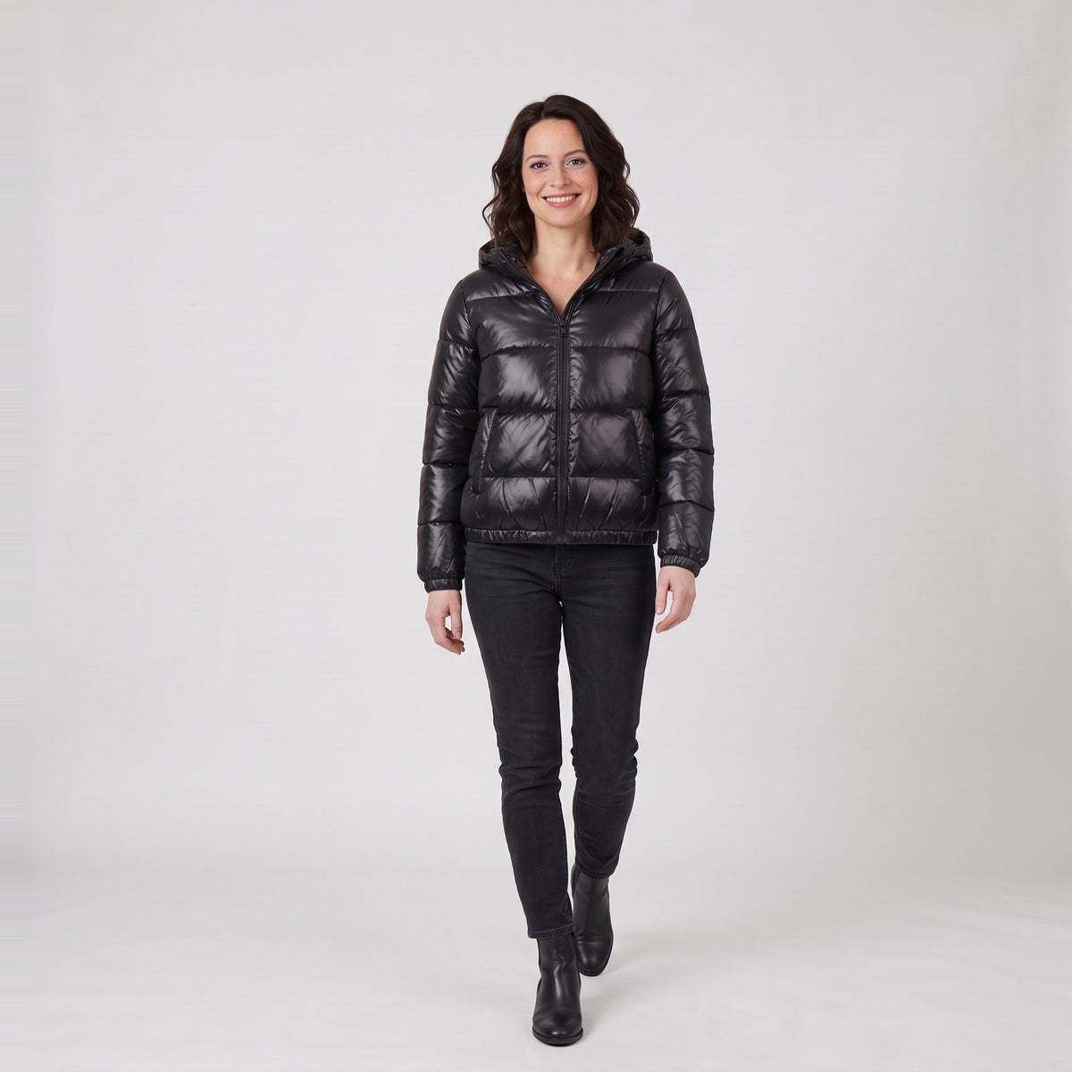 Woman wearing the glossy quilted hooded winter coat