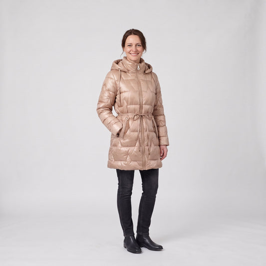 Woman wearing the glossy quilted longline winter coat with hood and star stitching