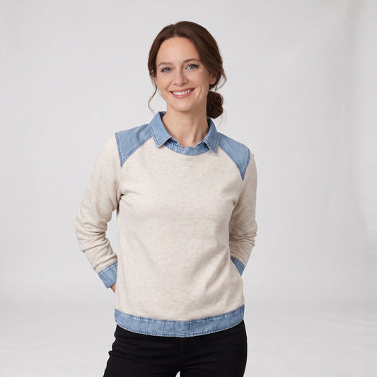 Woman wearing the layered look fleece sweatshirt jumper with denim shirt collar