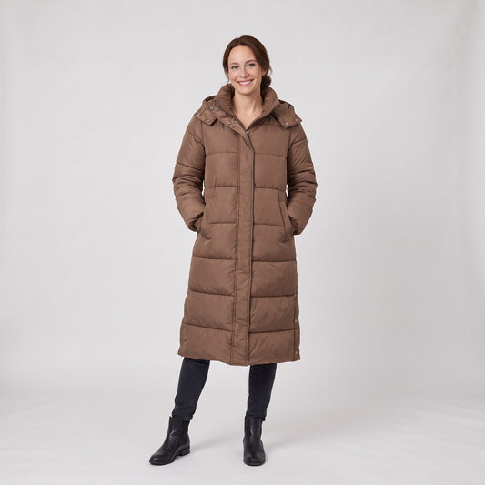 Woman wearing the long quilted puffer coat with two way zip