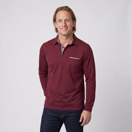 Man wearing the long sleeve polo shirt with check contrast collar
