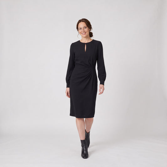 Woman wearing the long sleeve winter midi dress with keyhole neckline