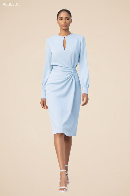Model wearing the sky blue long sleeve midi dress with keyhole neckline and draped waist, front view