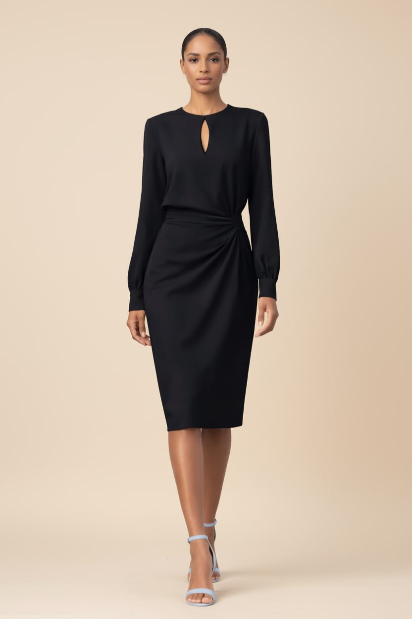 Model wearing the black long sleeve midi dress with keyhole neckline, front view