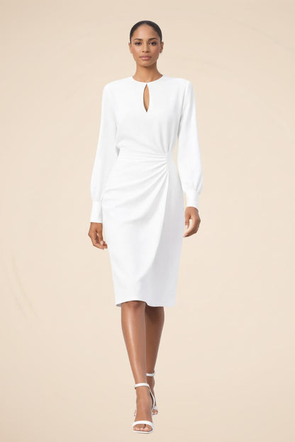 Model wearing the white long sleeve midi dress with draped waist, front view