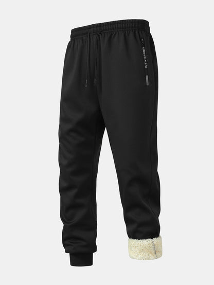 Black joggers with drawstring waist and zipped pocket