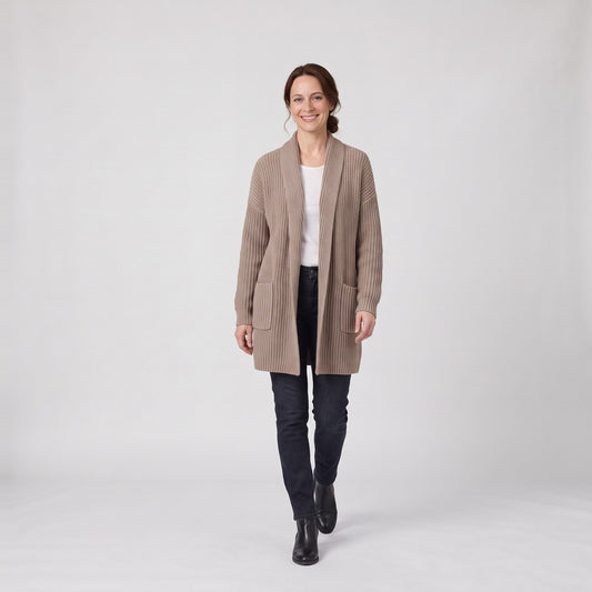 Woman wearing the open front longline cardigan with shawl collar and pockets