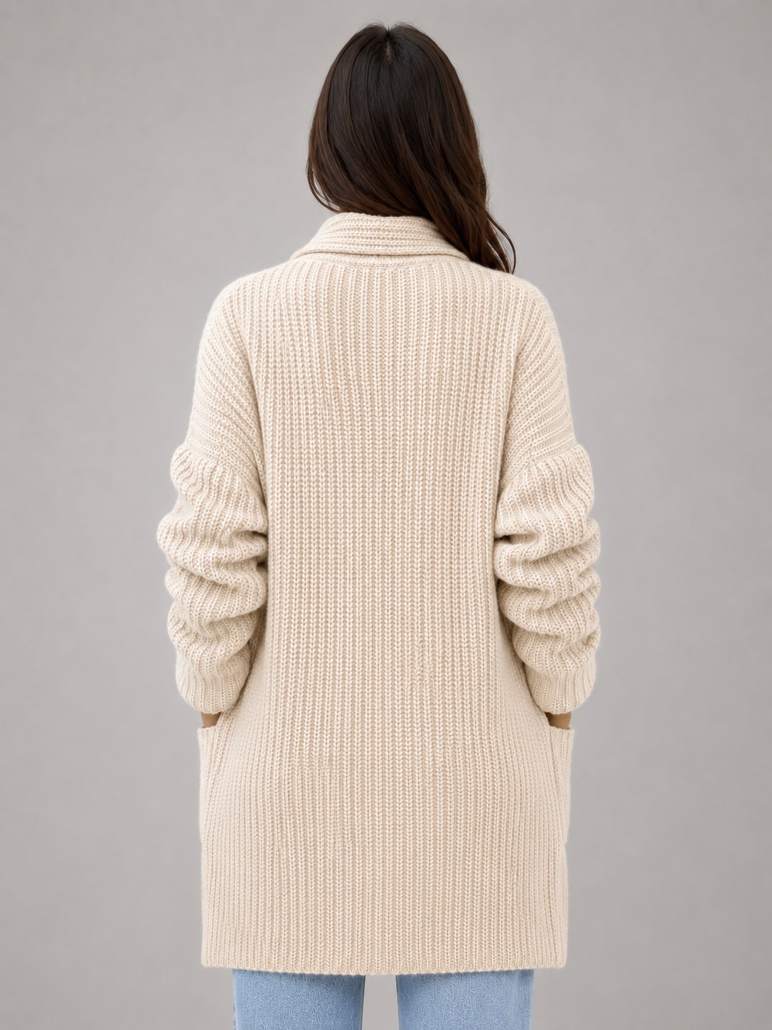 Back view of the beige open front cardigan in soft rib knit