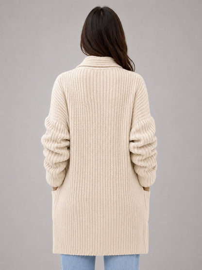 Back view of the beige open front cardigan in soft rib knit