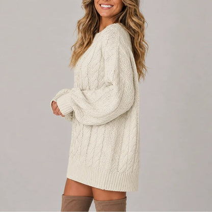 Cream cable knit jumper dress, side view showing the balloon sleeves