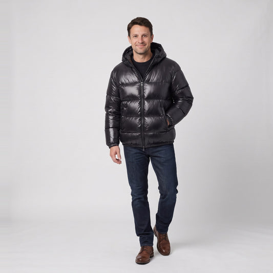 Man wearing the oversized glossy puffer jacket with hood
