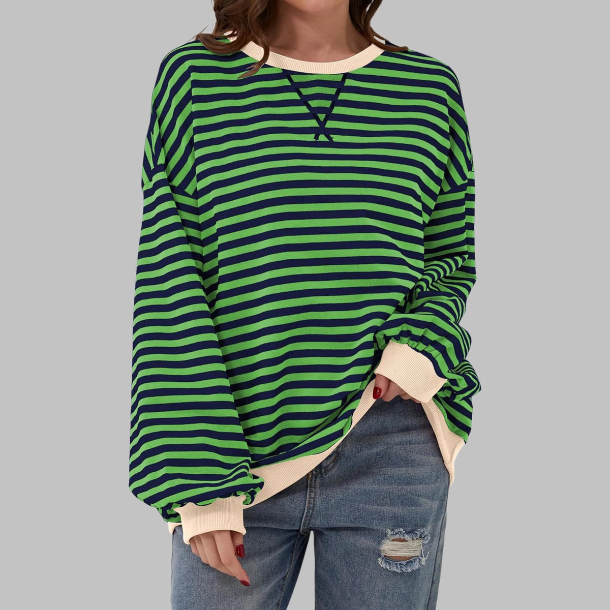 Green striped oversized sweater with cream trim