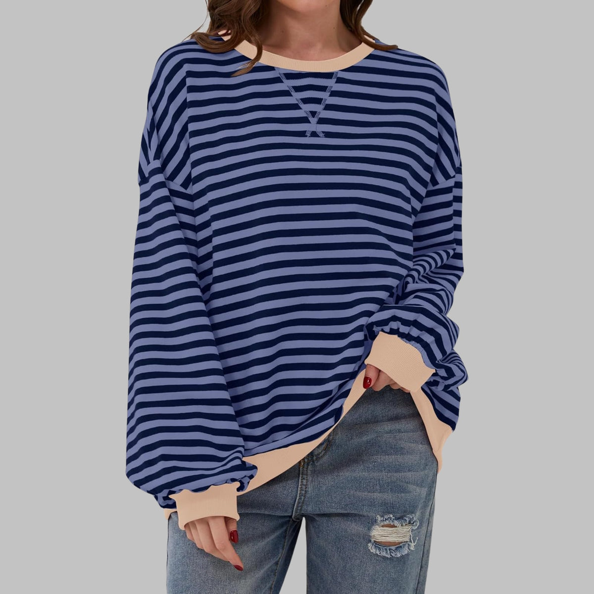 Navy striped oversized sweater with beige trim