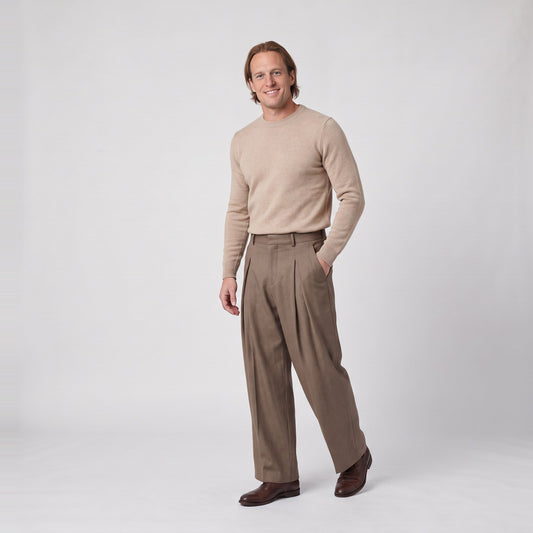 Man wearing the pleated high waist wide leg trousers
