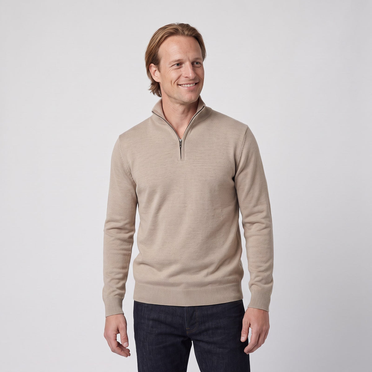 Man wearing the quarter zip knit jumper with structured collar