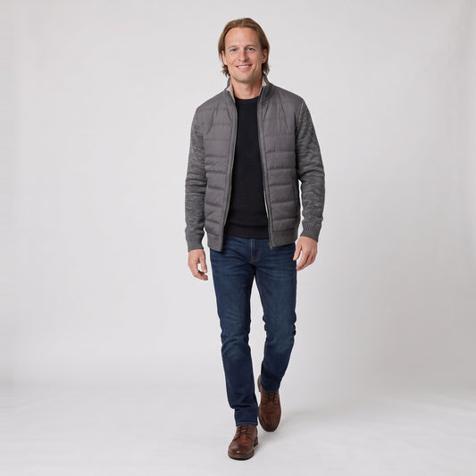Man wearing the quilted front jacket with knit sleeves and fleece lining