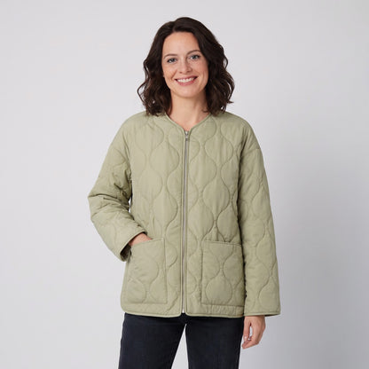 Light green quilted collarless zip jacket with patch pockets