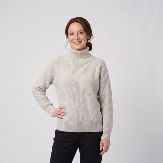 Woman wearing the relaxed diamond rib knit turtleneck sweater