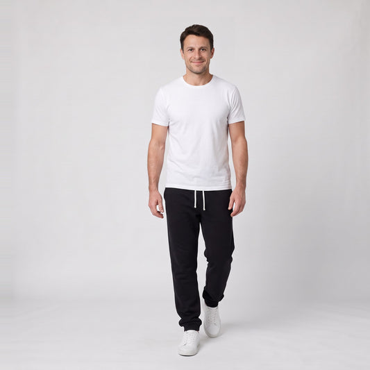 Man wearing the relaxed knit joggers with drawstring waist