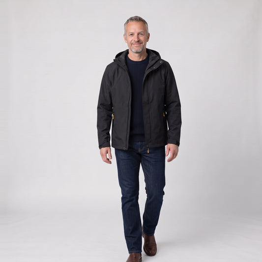 Man wearing the slim fit hooded rain jacket with zip pockets