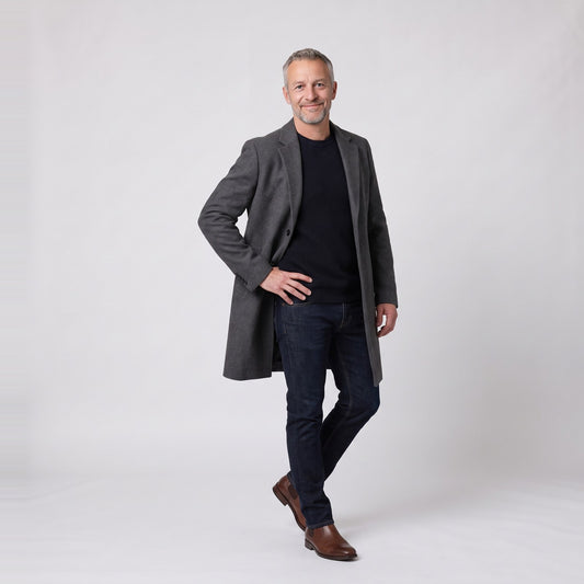 Man wearing the slim fit single breasted long overcoat with notch lapels