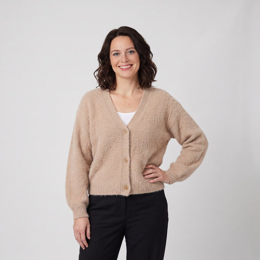 Woman wearing the soft knit button cardigan with v neck and ribbed trims