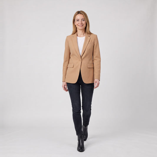 Woman wearing the tailored single button blazer with notch lapels