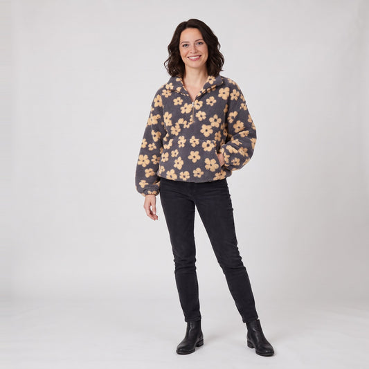 Woman wearing the oversized half zip floral sherpa teddy fleece pullover