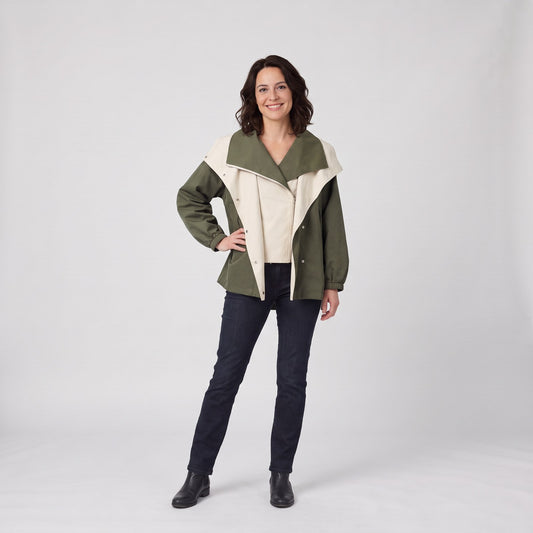 Woman wearing the two tone loose fit rain jacket with wide collar