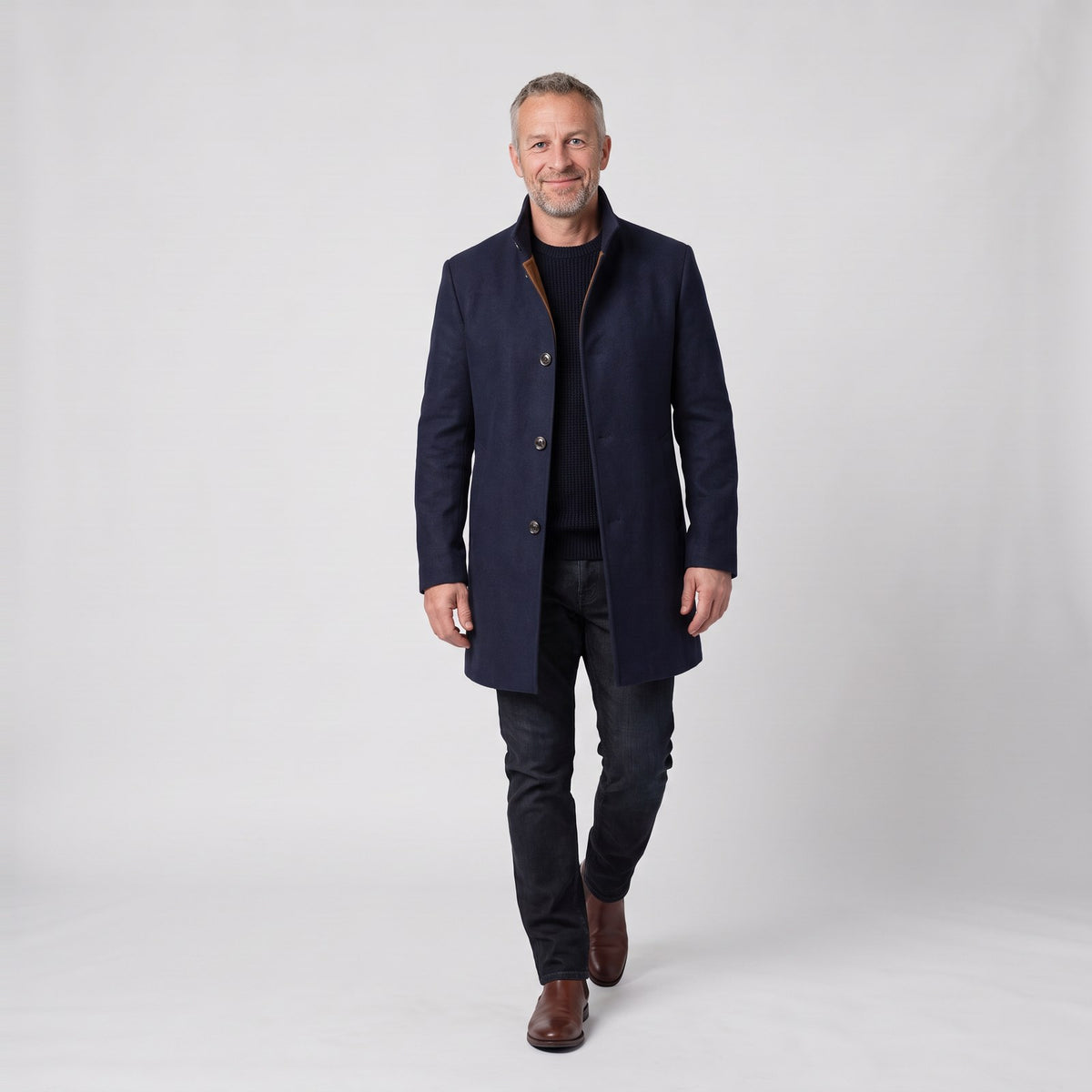 Man wearing the warm wool blend winter overcoat with stand collar