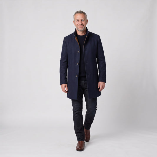 Man wearing the warm wool blend winter overcoat with stand collar