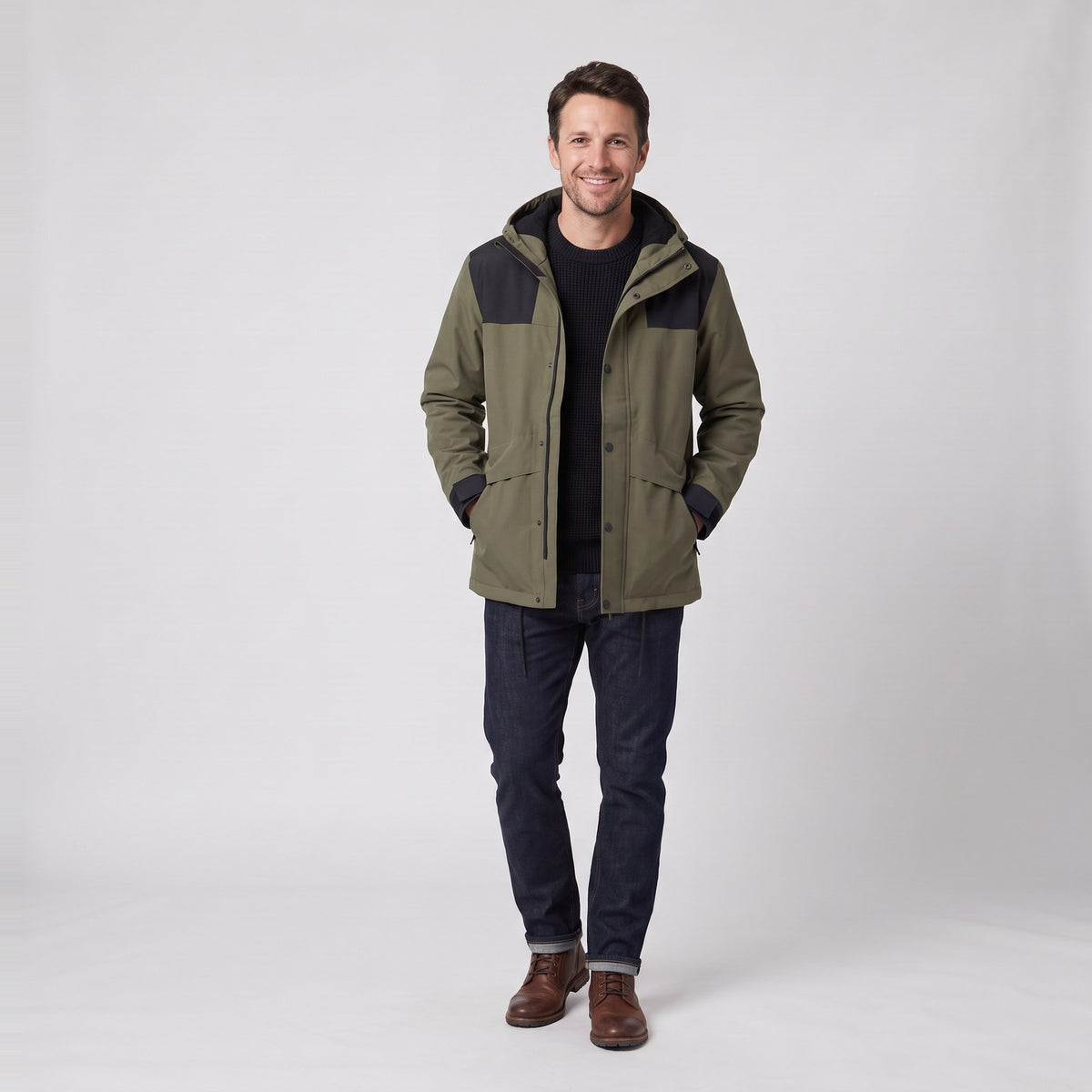 Man wearing the waterproof hooded rain jacket with contrast shoulders