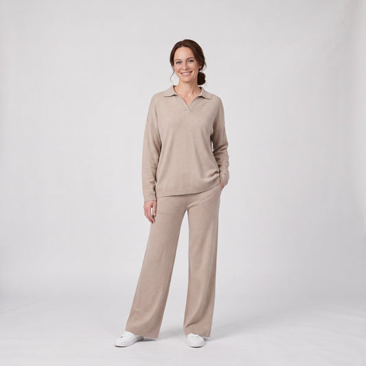 Woman wearing the knit lounge set polo jumper wide leg trousers