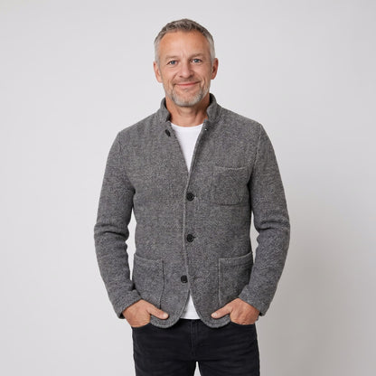 Grey textured wool coat with stand collar, three buttons and patch pockets